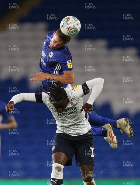 270819 - Cardiff City v Luton Town, EFL  Cup, Round 2 - Will Vaulks of Cardiff City gets above Pelly-Ruddock Mpanza of Luton Town to head the ball