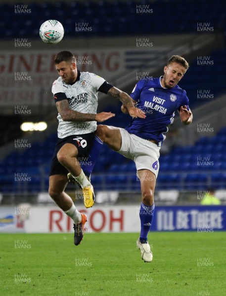 270819 - Cardiff City v Luton Town, EFL  Cup, Round 2 - Will Vaulks of Cardiff City challenges George Moncur of Luton Town for the ball