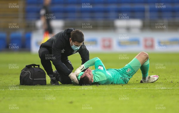 281120 - Cardiff City v Luton Town, Sky Bet Championship -  Luton Town goalkeeper Simon Sluga receives treatment for injury