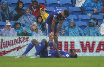 220918 - Cardiff City v Manchester City, Premier League - Bruno Ecuele Manga of Cardiff City and Greg Cunningham of Cardiff City show the disappointment after Manchester City score the fifth goal