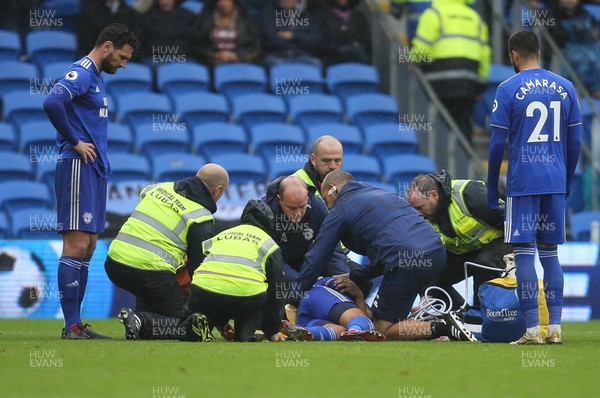 220918 - Cardiff City v Manchester City, Premier League - Lee Peltier of Cardiff City receives treatment before being stretchered off