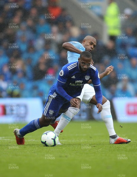 220918 - Cardiff City v Manchester City, Premier League - Junior Hoilett of Cardiff City is brought down by Fernandinho of Manchester City