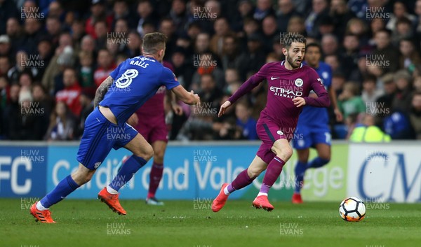 280118 - Cardiff City v Manchester City - FA Cup - Bernardo Silva of Manchester City is challenged by Joe Ralls of Cardiff City