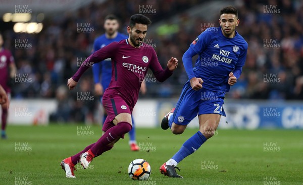 280118 - Cardiff City v Manchester City - FA Cup - Ilkay Gundogan of Manchester City is challenged by Marko Grujic of Cardiff City