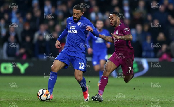 280118 - Cardiff City v Manchester City - FA Cup - Liam Feeney of Cardiff City is tackled by Raheem Sterling of Manchester City