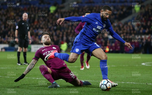280118 - Cardiff City v Manchester City - FA Cup - Liam Feeney of Cardiff City is tackled by Nicolas Otamendi of Manchester City