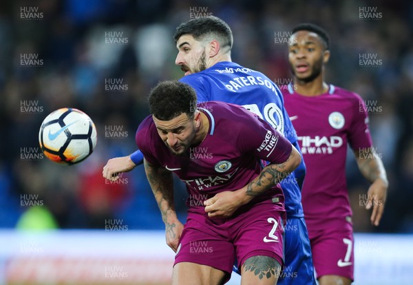 280118 - Cardiff City v Manchester City, Emirates FA Cup Fourth Round - Kyle Walker of Manchester City and Callum Paterson of Cardiff City compete for the ball