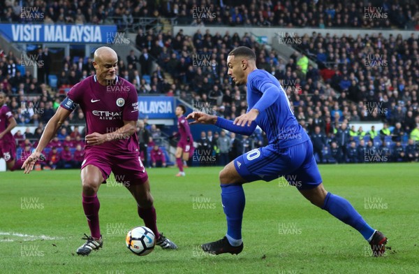280118 - Cardiff City v Manchester City, Emirates FA Cup Fourth Round - Kenneth Zohore of Cardiff City takes on Vincent Kompany of Manchester City
