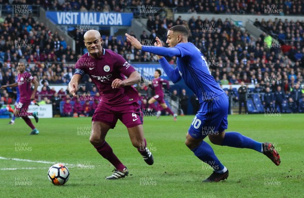 280118 - Cardiff City v Manchester City, Emirates FA Cup Fourth Round - Kenneth Zohore of Cardiff City takes on Vincent Kompany of Manchester City