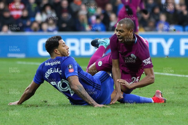 280118 - Cardiff City v Manchester City, Emirates FA Cup Fourth Round - Fernandinho of Manchester City is brought down by Nathaniel Mendez-Laing of Cardiff City