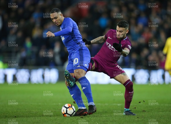 280118 - Cardiff City v Manchester City, Emirates FA Cup Fourth Round - Kenneth Zohore of Cardiff City and Nicolas Otamendi of Manchester City compete for the ball
