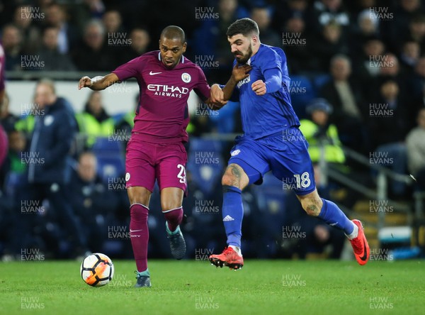 280118 - Cardiff City v Manchester City, Emirates FA Cup Fourth Round - Fernandinho of Manchester City and Callum Paterson of Cardiff City compete for the ball
