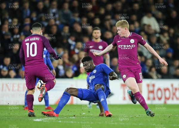 280118 - Cardiff City v Manchester City, Emirates FA Cup Fourth Round - Bruno Ecuele Manga of Cardiff City takes on Sergio Aguero of Manchester City and Kevin De Bruyne of Manchester City