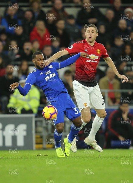 221218 - Cardiff City v Manchester United, Premier League - Junior Hoilett of Cardiff City and Nemanja Matic of Manchester United compete for the ball
