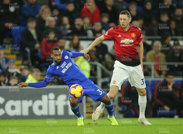 221218 - Cardiff City v Manchester United, Premier League - Junior Hoilett of Cardiff City and Nemanja Matic of Manchester United compete for the ball
