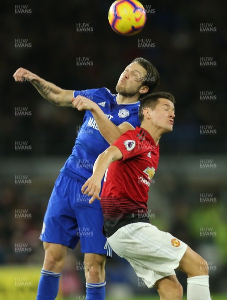 221218 - Cardiff City v Manchester United, Premier League - Harry Arter of Cardiff City and Ander Herrera of Manchester United compete for the ball