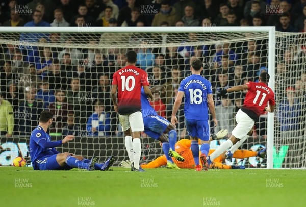 221218 - Cardiff City v Manchester United, Premier League - Anthony Martial of Manchester United scores United's third goal
