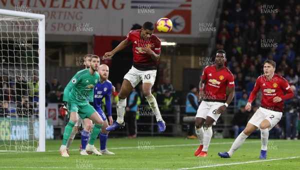 221218 - Cardiff City v Manchester United, Premier League - Marcus Rashford of Manchester United heads the ball away from goal