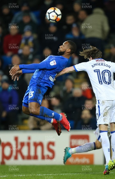 060118 - Cardiff City v Mansfield Town, Emirates FA Cup Round 3 - Junior Hoilett of Cardiff City beats Paul Anderson of Mansfield Town to head the ball