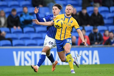 291125 - Cardiff City v Mansfield Town - Sky Bet League 1 - Cian Ashford of Cardiff City is challenged by Frazer Blake-Tracy of Mansfield