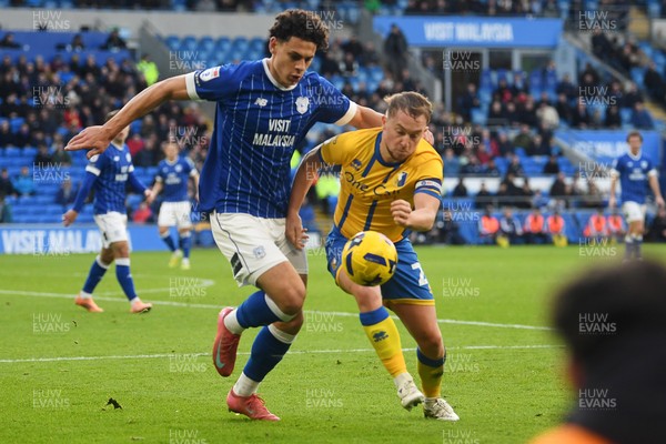 291125 - Cardiff City v Mansfield Town - Sky Bet League 1 - Yousef Salech of Cardiff City is challenged by Louis Reed of Mansfield
