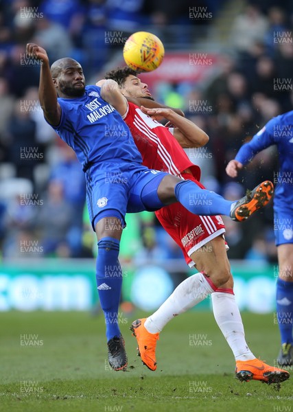 170218 - Cardiff City v Middlesbrough, Sky Bet Championship - Sol Bamba of Cardiff City and Rudy Gestede of Middlesbrough compete for the ball
