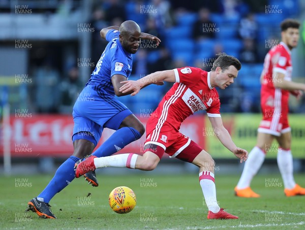 170218 - Cardiff City v Middlesbrough, Sky Bet Championship - Sol Bamba of Cardiff City and Jonathan Howson of Middlesbrough compete for the ball