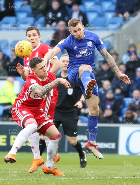 170218 - Cardiff City v Middlesbrough, Sky Bet Championship - Joe Ralls of Cardiff City gets above Muhamed Besic of Middlesbrough as he looks to head at goal