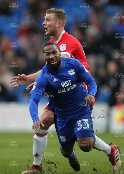 170218 - Cardiff City v Middlesbrough, Sky Bet Championship - Junior Hoilett of Cardiff City is brought down by Ben Gibson of Middlesbrough
