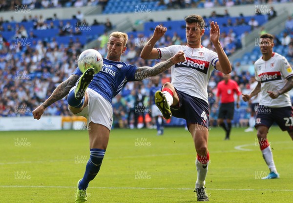 210919 - Cardiff City v Middlesbrough, SkyBet Championship - Aden Flint of Cardiff City wins the ball under pressure from Daniel Ayala of Middlesbrough