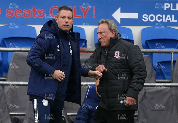 241020 - Cardiff City v Middlesbrough - SkyBet Championship - Cardiff City Manager Neil Harris and Middlesbrough Manager Neil Warnock