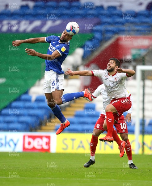 241020 - Cardiff City v Middlesbrough - SkyBet Championship - Curtis Nelson of Cardiff City is challenged by Sam Morsy of Middlesbrough