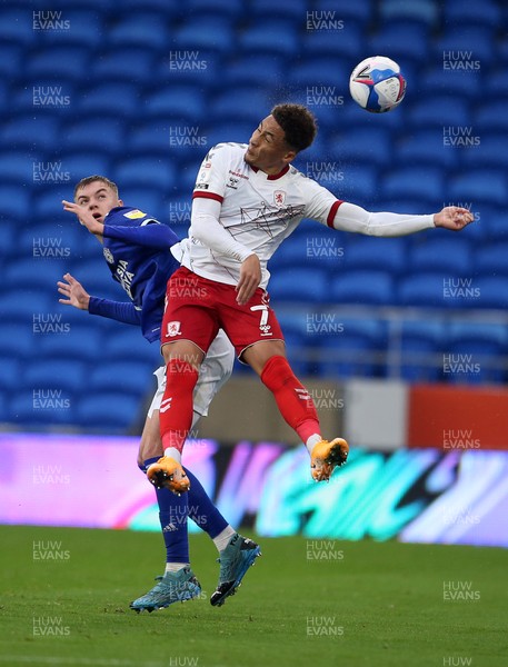 241020 - Cardiff City v Middlesbrough - SkyBet Championship - Marcus Tavernier of Middlesbrough is challenged by Joel Bagan of Cardiff City