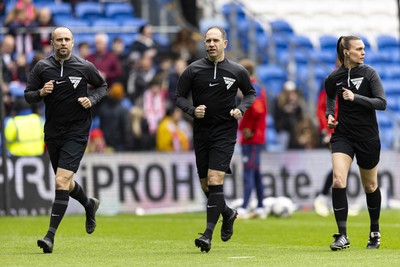 270424 - Cardiff City v Middlesbrough - Sky Bet Championship - Referee Jeremy Simpson & Assistant Referees Rob Hyde & Natalie Aspinall during the warm up