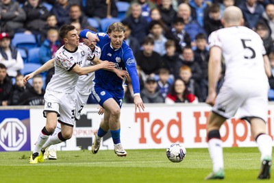 270424 - Cardiff City v Middlesbrough - Sky Bet Championship - Josh Bowler of Cardiff City in action against Luke Thomas of Middlesbrough