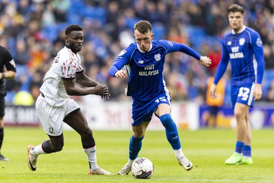 270424 - Cardiff City v Middlesbrough - Sky Bet Championship - David Turnbull of Cardiff City in action against Emmanuel Latte Lath of Middlesbrough