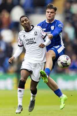 270424 - Cardiff City v Middlesbrough - Sky Bet Championship - Ollie Tanner of Cardiff City in action against Isaiah Jones of Middlesbrough