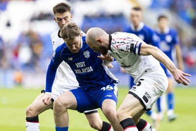 270424 - Cardiff City v Middlesbrough - Sky Bet Championship - Josh Bowler of Cardiff City in action against Matthew Clarke of Middlesbrough