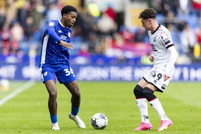 270424 - Cardiff City v Middlesbrough - Sky Bet Championship - Raheem Conte of Cardiff City in action against Law McCabe of Middlesbrough