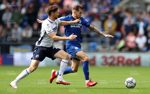 210821 - Cardiff City v Millwall - SkyBet Championship - Joe Ralls of Cardiff City is challenged by George Evans of Millwall