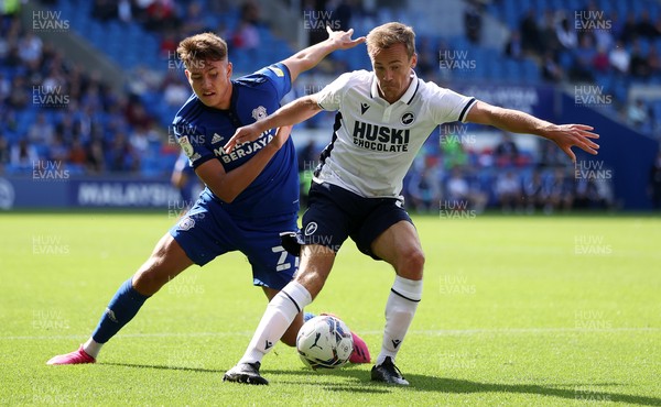210821 - Cardiff City v Millwall - SkyBet Championship - Maikel Kieftenbeld of Millwall is challenged by Rubin Colwill of Cardiff City