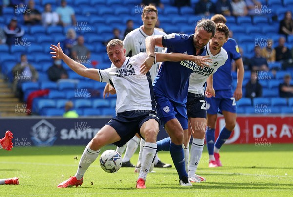 210821 - Cardiff City v Millwall - SkyBet Championship - Daniel Ballard of Millwall is challenged by Sean Morrison of Cardiff City