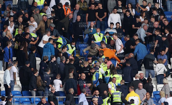 210821 - Cardiff City v Millwall - SkyBet Championship - Trouble breaks out in the away end amongst the Millwall fans