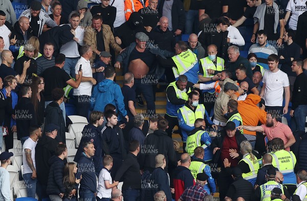 210821 - Cardiff City v Millwall - SkyBet Championship - Trouble breaks out in the away end amongst the Millwall fans