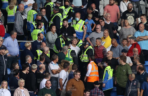 210821 - Cardiff City v Millwall - SkyBet Championship - A Millwall fan is removed by police