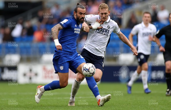 210821 - Cardiff City v Millwall - SkyBet Championship - Marlon Pack of Cardiff City is challenged by George Saville of Millwall