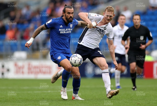 210821 - Cardiff City v Millwall - SkyBet Championship - Marlon Pack of Cardiff City is challenged by George Saville of Millwall