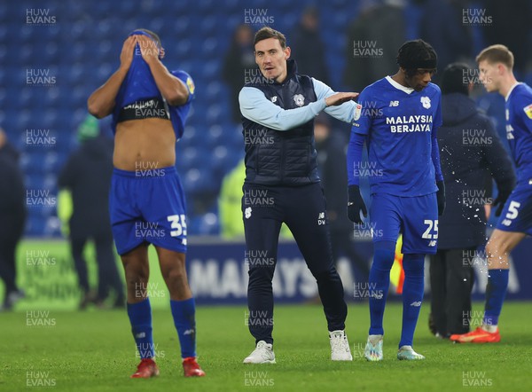210123 - Cardiff City v Millwall, EFL Sky Bet Championship - Cardiff City caretaker manager Dean Whitehead with Andy Rinomhota of Cardiff City and Jaden Philogene of Cardiff City at the end of the match
