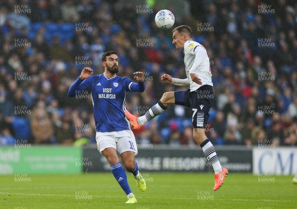 261219 - Cardiff City v Millwall, Sky Bet Championship - Jed Wallace of Millwall beats Marlon Pack of Cardiff City to the ball