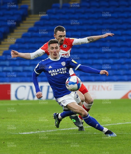 300121 - Cardiff City v Millwall, Sky Bet Championship - Harry Wilson of Cardiff City holds off Scott Malone of Millwall